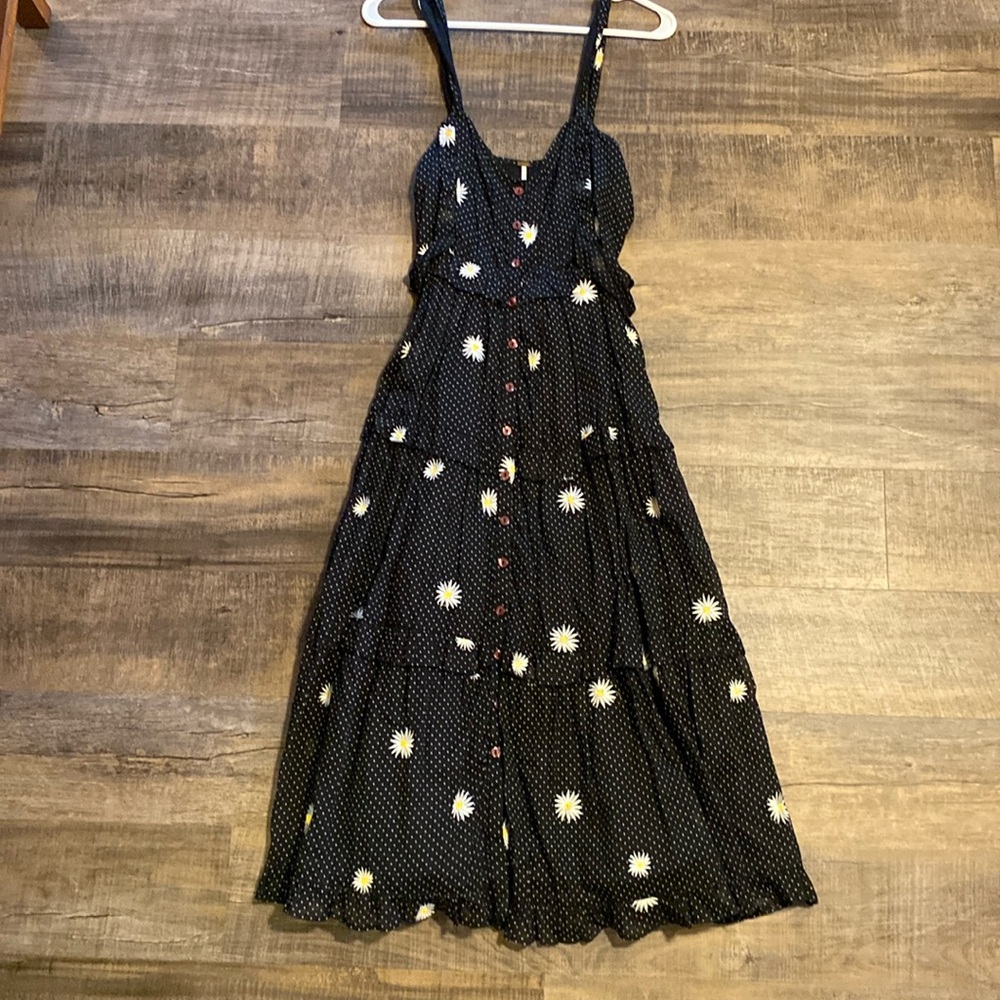 Free people XS black midi dress with sunflower details.